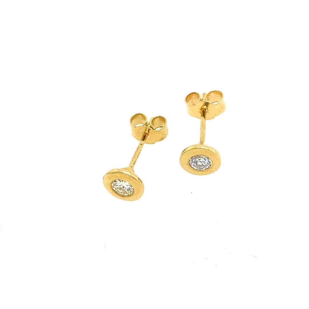 New 18ct Yellow Gold Diamond Studs Earrings, In Rubover Setting, 0.35ct of diamonds

In Rubover Setting. With Peg and Screw.

Additional Information:
Total Diamond Weight: 0.35ct
Diamond Colour: G/H
Diamond Clarity: SI
Total Weight: 1.3g  
SMS4072