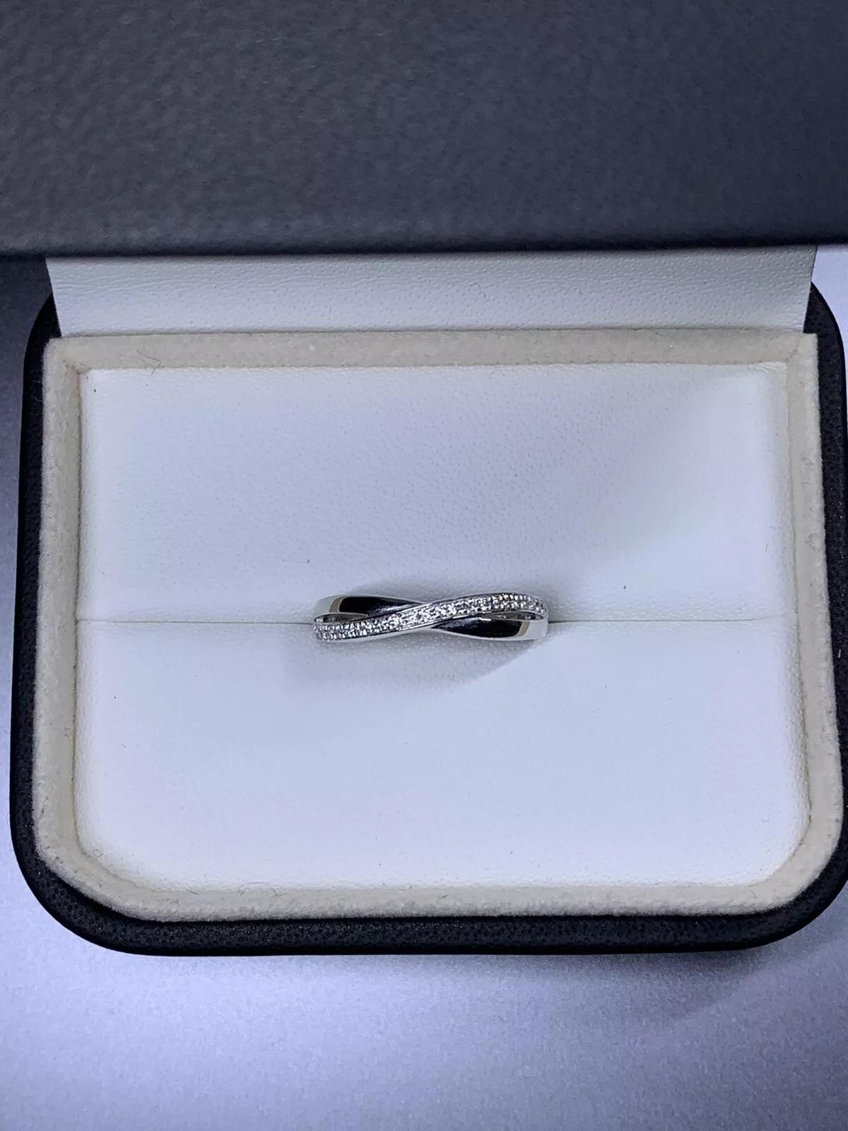 Taille ronde 0.35ct Bague de fiançailles solitaire infini torsadé en platine 6.56G en vente