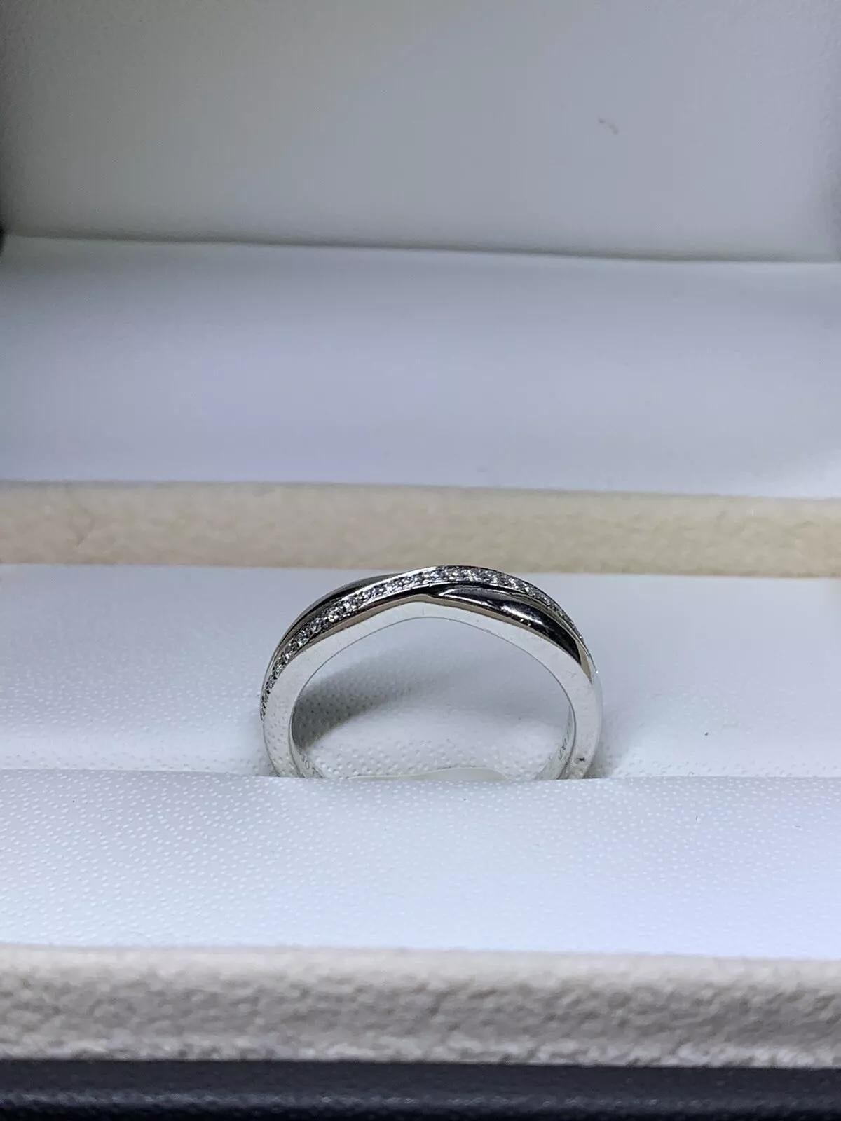 0.35ct Bague de fiançailles solitaire infini torsadé en platine 6.56G Unisexe en vente