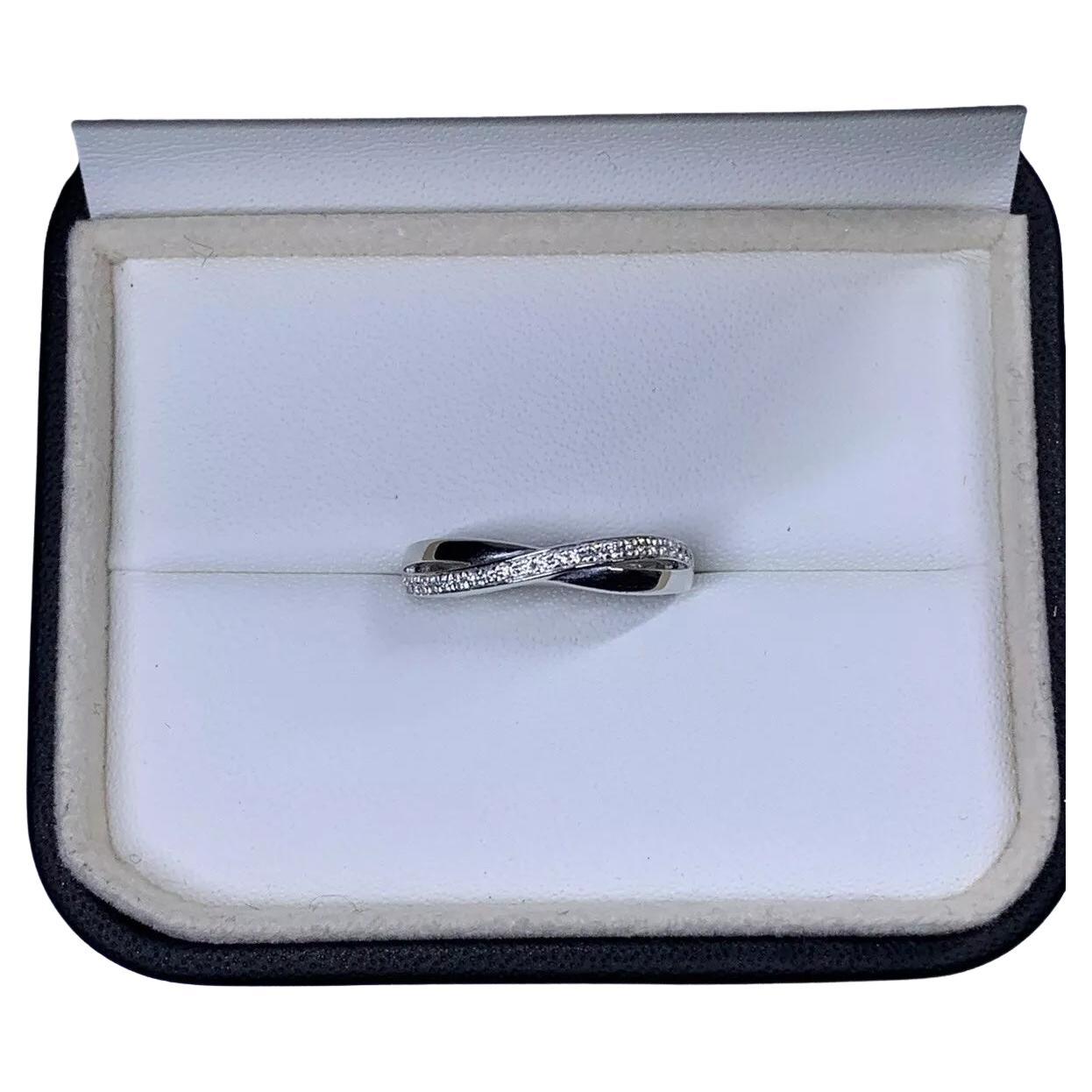 0.35ct Bague de fiançailles solitaire infini torsadé en platine 6.56G en vente