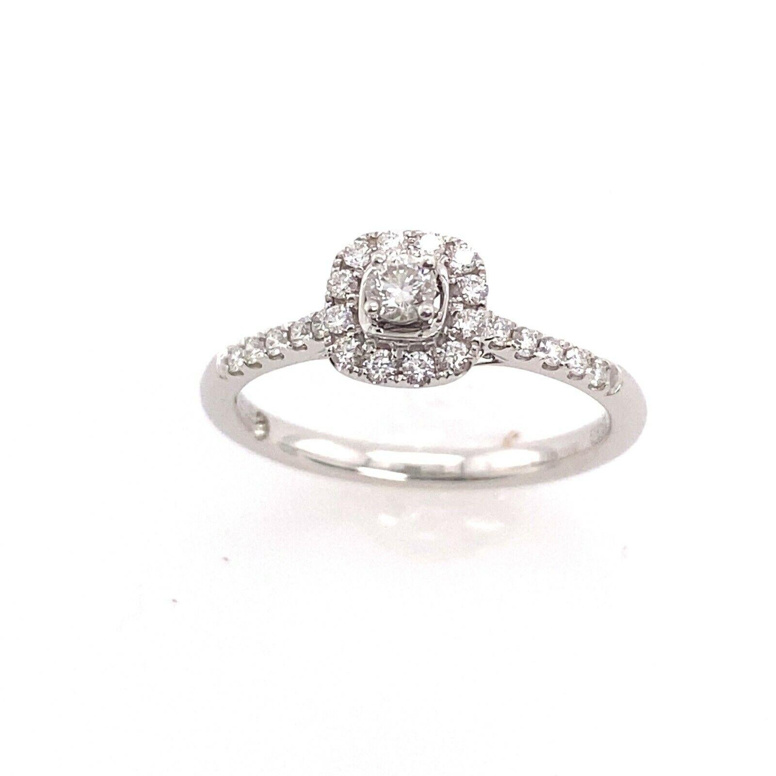 18ct White Gold Halo Cushion Shape Cluster Set With 0.35ct Of Diamonds

This stunning halo ring is the perfect symbol of your commitment to love. The ring is set in an 18ct white gold band, surrounded by stunning round diamonds.This ring is elegant