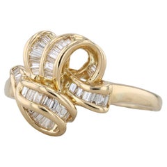 0,35 ctw Anillo nudo de diamantes baguette Oro amarillo 18k Talla 10.25