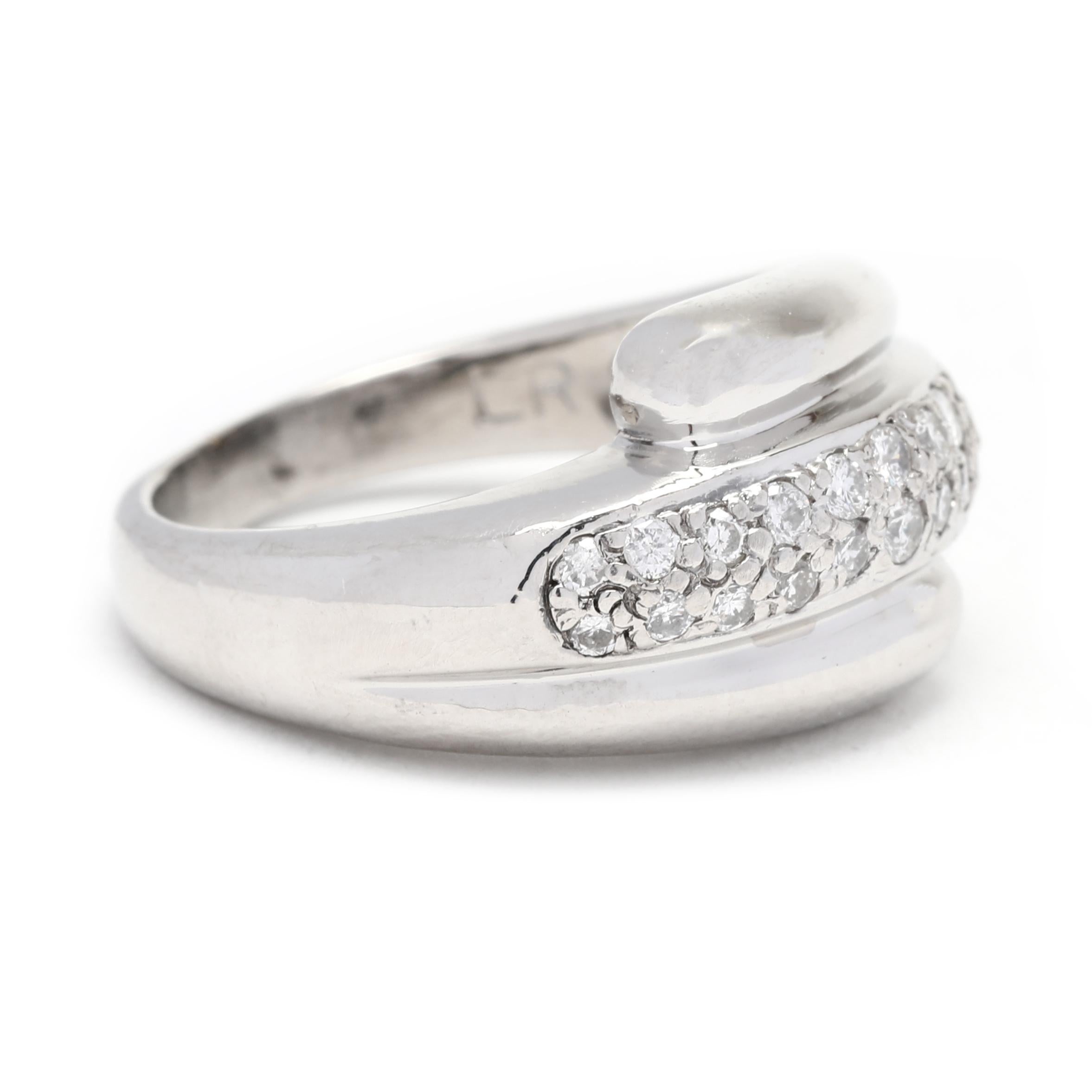 This beautiful 0.35ctw diamond bypass dome ring is set in platinum and designed to make a statement. Featuring a bypass dome shape with a diamond-studded band, this exquisite ring is perfect for everyday wear or special occasions. The diamonds