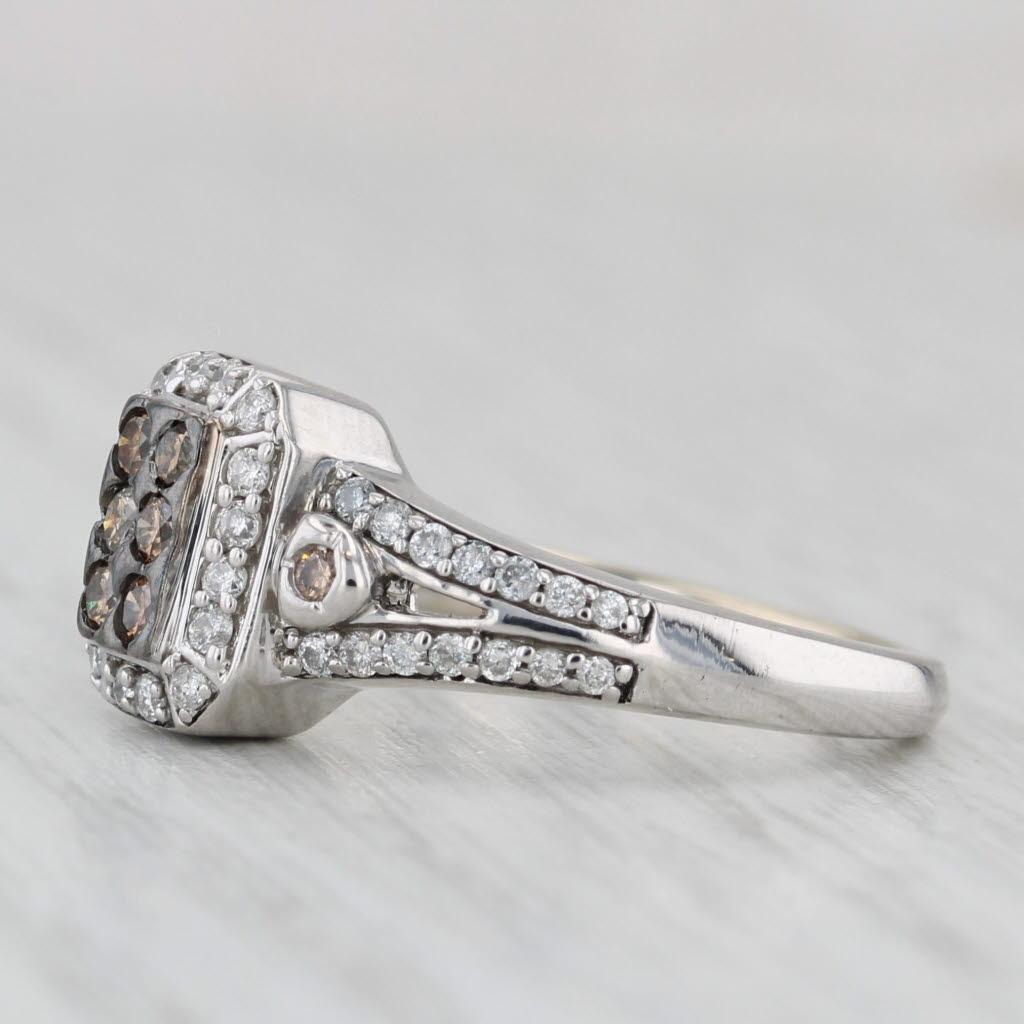 Gemstone Information:
- Natural Diamonds -
Total Carats - 0.14ctw
Cut - Round Brilliant
Color - Brown
Clarity - SI1 - I1

- Natural Diamonds -
Total Carats - 0.21ctw
Cut - Round Brilliant
Color - I - J
Clarity - I1 - I2

Metal: 14k White