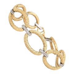 0.35ctw Diamond Two Tone Oval Link Matte Textured Bracelet in 14K Gold