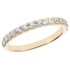 Eternity-Ring aus 14 Karat Gelbgold mit 0,36 Karat Aquamarin.