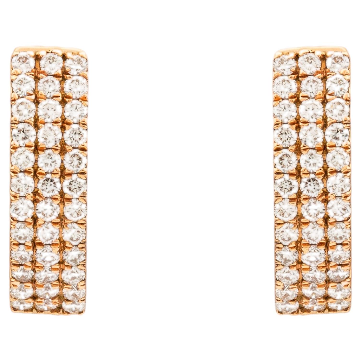 Dreireihige Pavé-Huggie-Creolen aus 18 Karat Gold mit Brillanten im Brillantschliff (0,36 Karat)