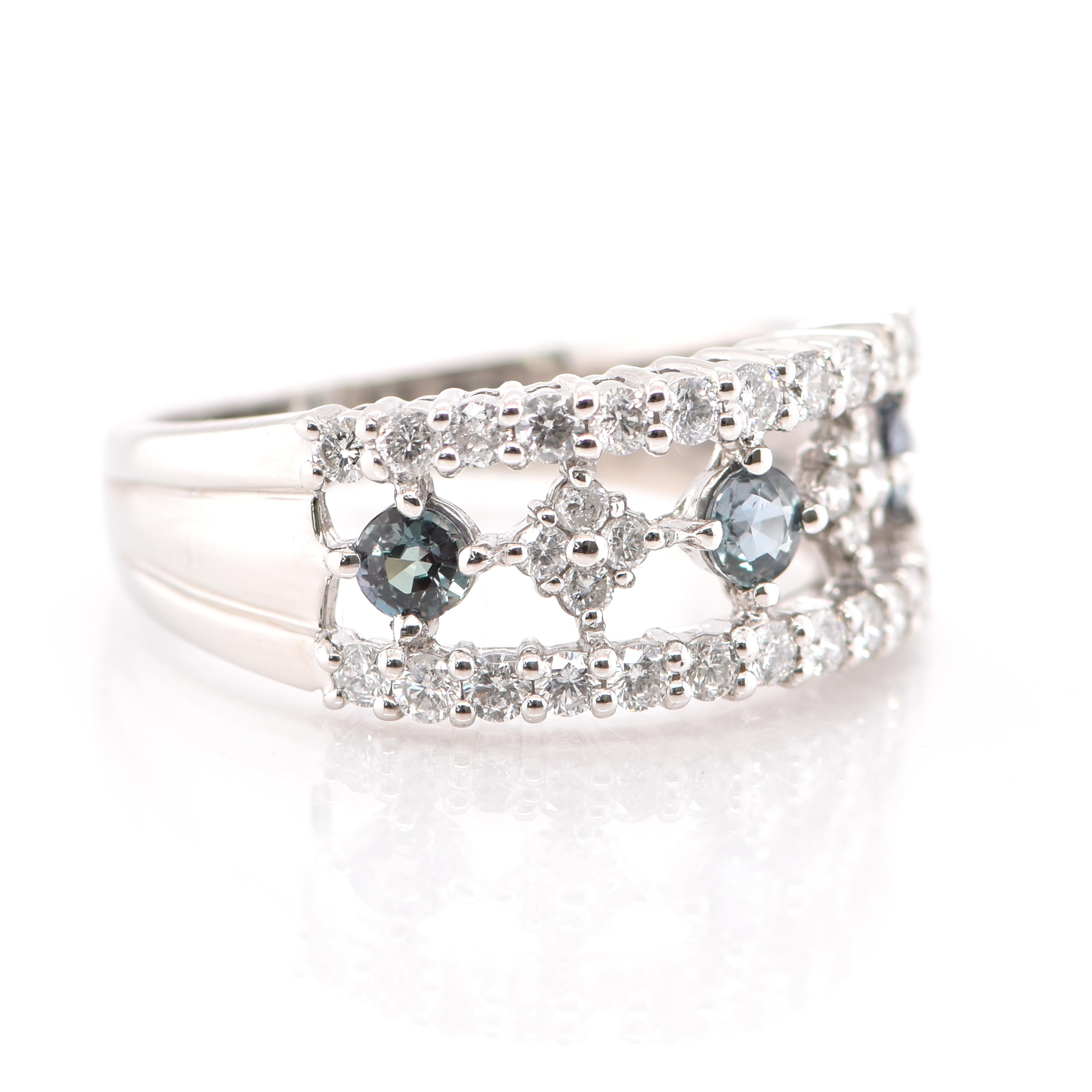A gorgeous Cocktail Ring featuring 0.36 Carats of Natural Alexandrite and 0.57 Carats of Diamond Accents set in Platinum. Alexandrites produce a natural color-change phenomenon as they exhibit a Bluish Green Color under Fluorescent Light whereas a