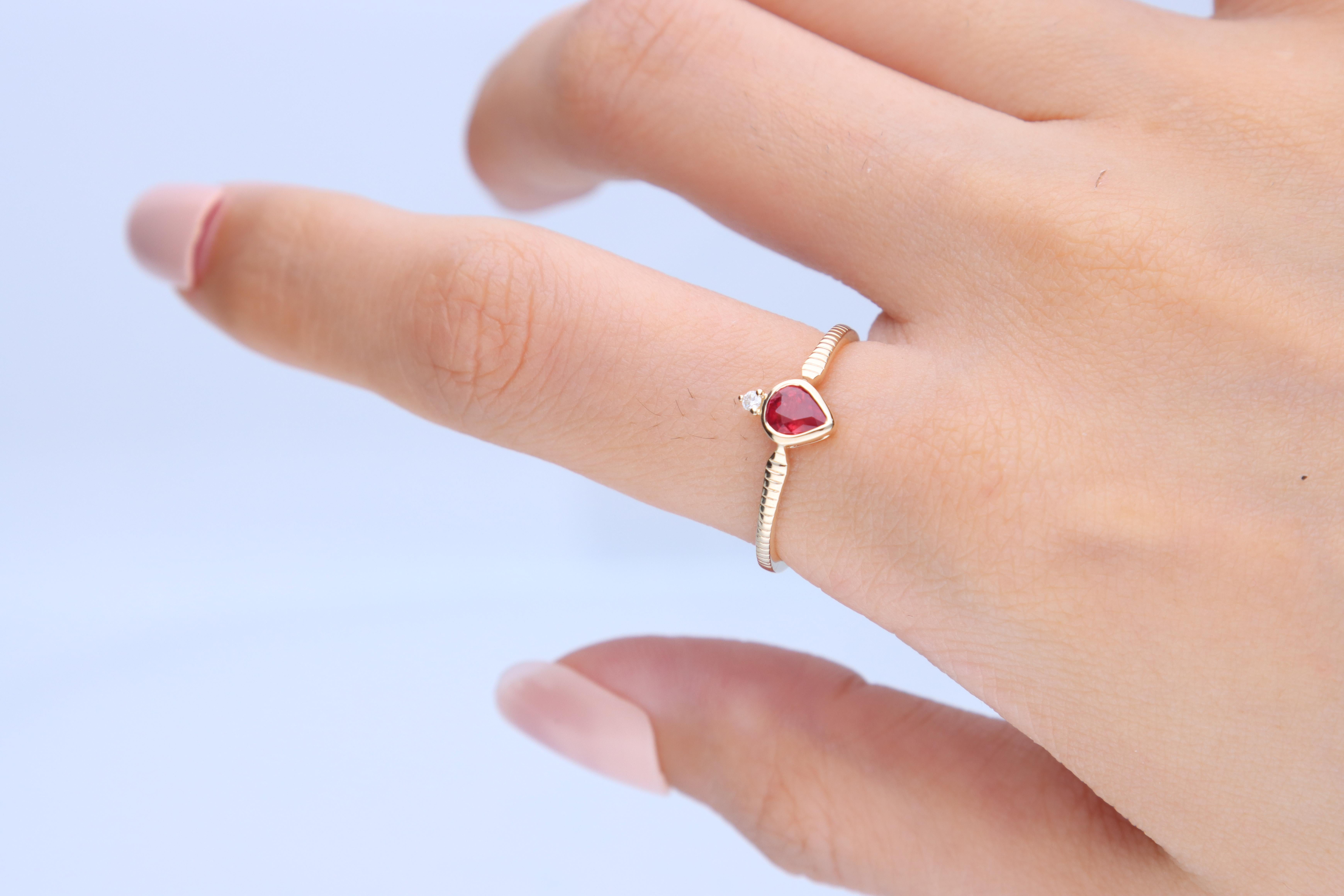 Stunning, timeless and classy eternity Unique ring. Decorate yourself in luxury with this Gin & Grace ring. The 14k Yellow Gold jewelry boasts 5x4 Pear-cut Ruby (1 pcs) 0.36 Carat and Round-Cut Diamond (1 pcs) 0.02 Carat accent stones for a lovely