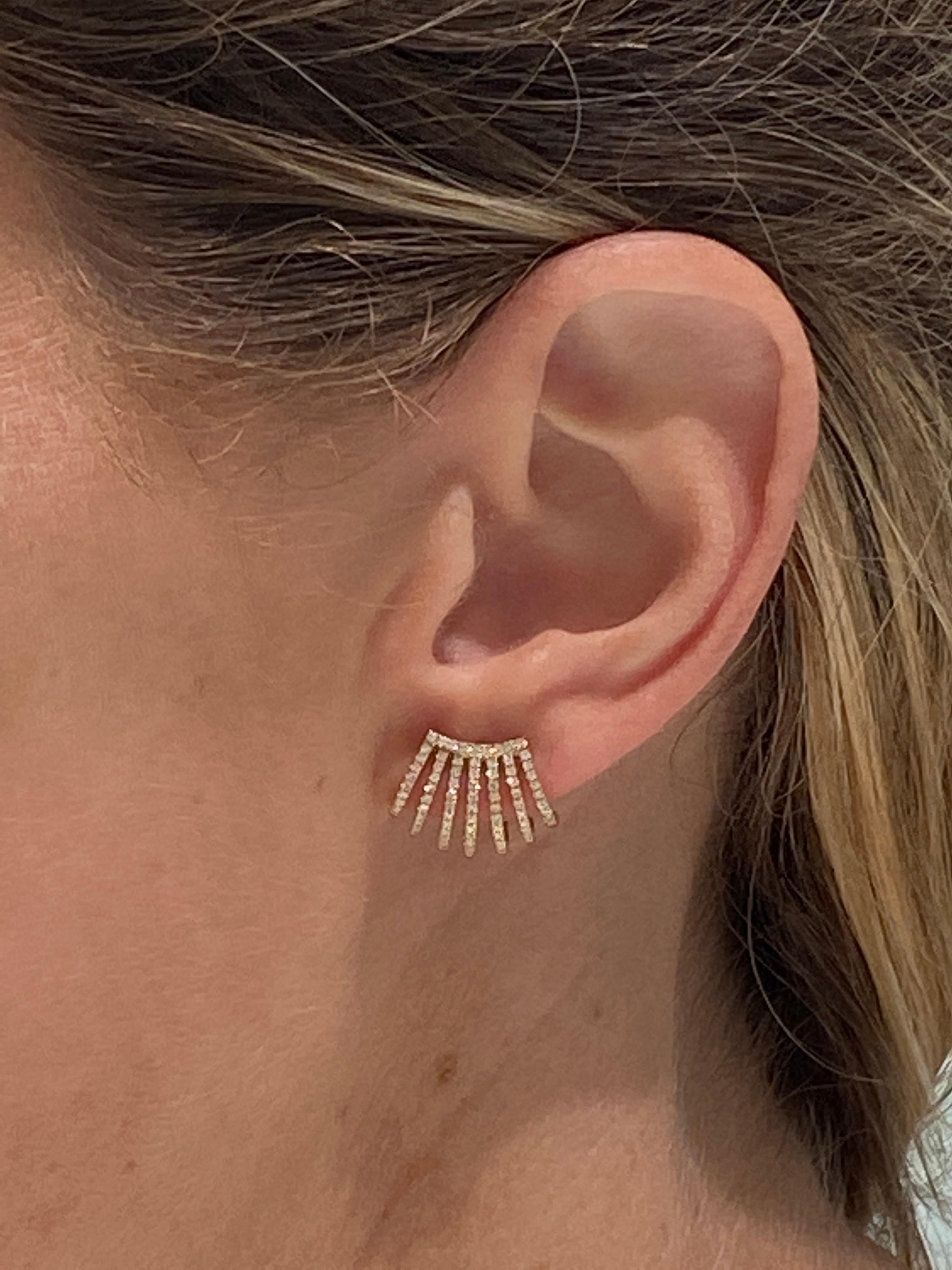 This 14 karat yellow gold ear cuff features seven rows that form a cage adorned with 0.36 carat total weight in round diamonds. It is set on a friction post with butterfly back. 
Measurements: 17x12mm
