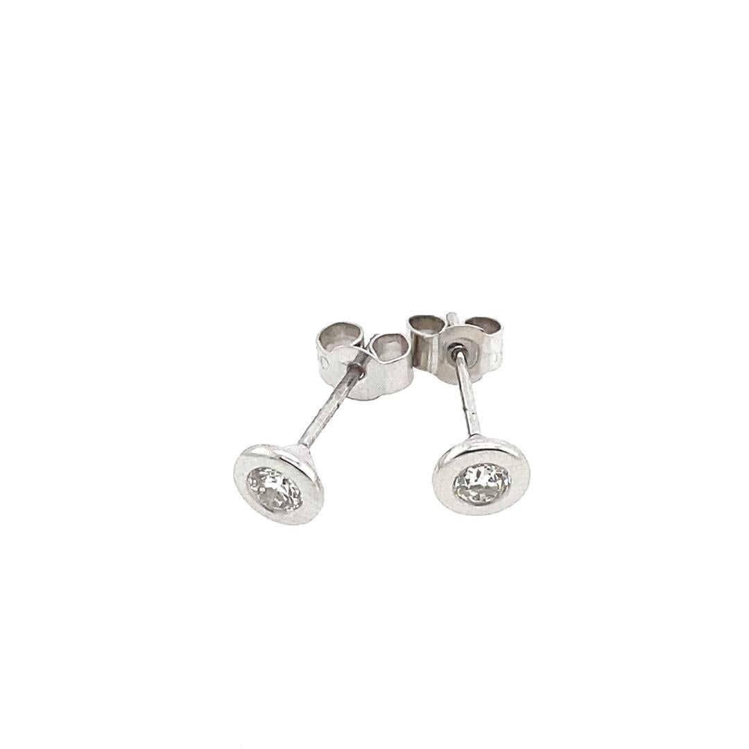 New 18ct White Gold Diamond Studs Earrings, In Rubover Setting, 0.36ct of Diamonds

In Rubover Setting With Peg and Screw

Additional Information:
Total Diamond Weight: 0.36ct
Diamond Colour: G/H
Diamond Clarity: SI
Total Weight: 1.2g  
SMS4080