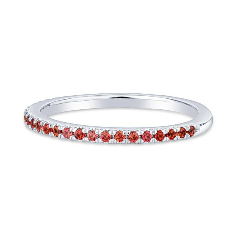 A petite band featuring 0.36 carats of natural orange sapphires set in 14 karat white gold. This band is approximately 1.7mm wide and is currently a size 6.75. It can be resized upon request.