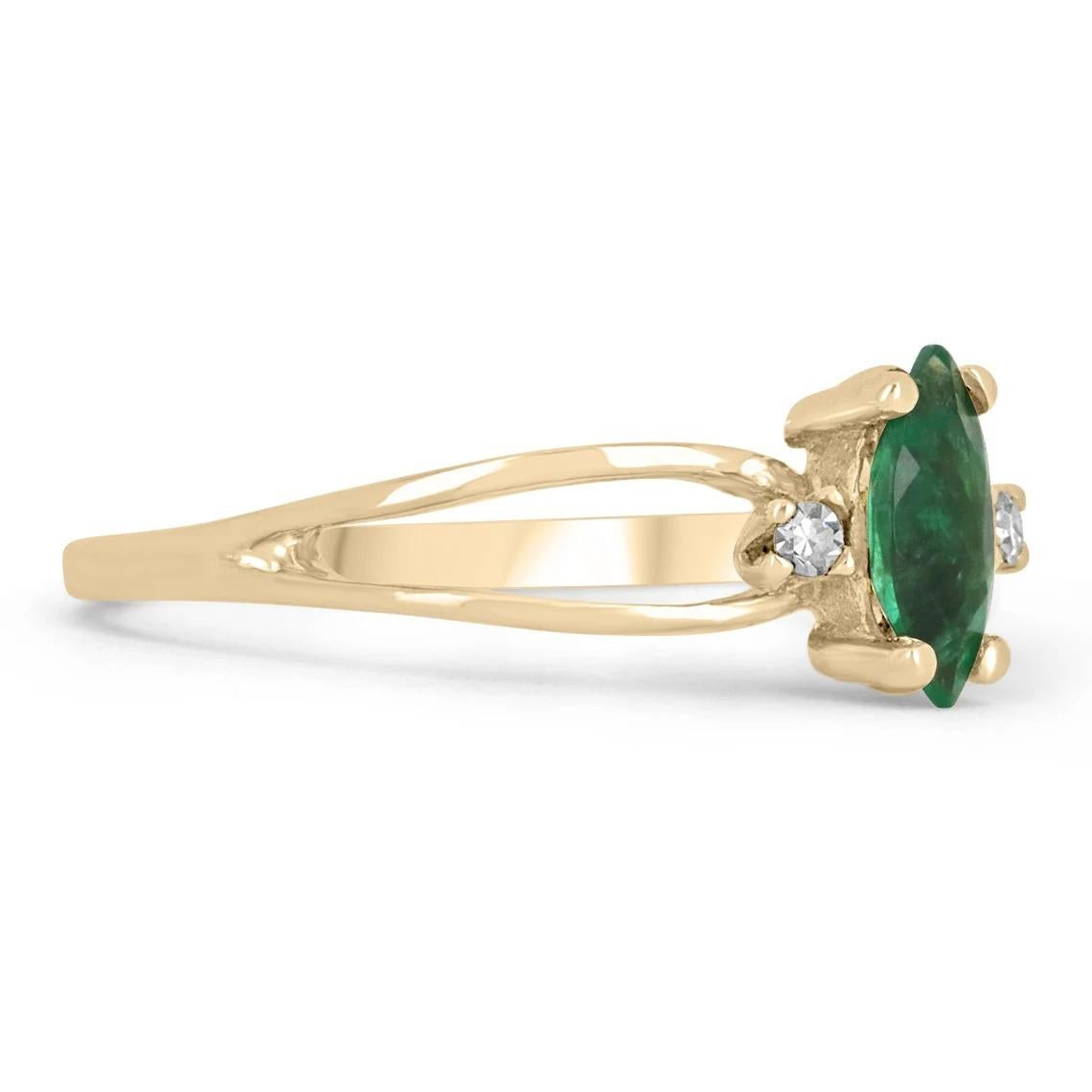 A petite, emerald and diamond three-stone ring. The center stone has a natural 0.35-carat, marquise-cut emerald. Showcasing a medium green color, and good luster. Accented on the sides are two baby diamonds, completing the three-stone look!

Setting