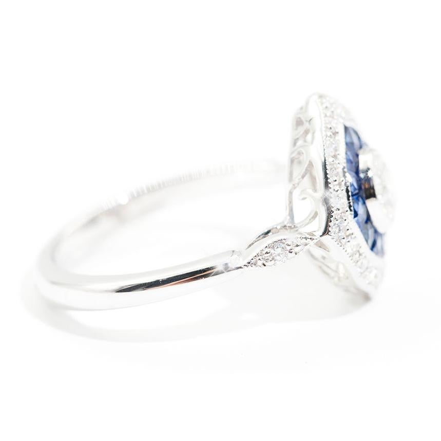 Pear Cut 0.37 Carat Diamond and Blue Sapphire 18 Carat White Gold Cluster Ring