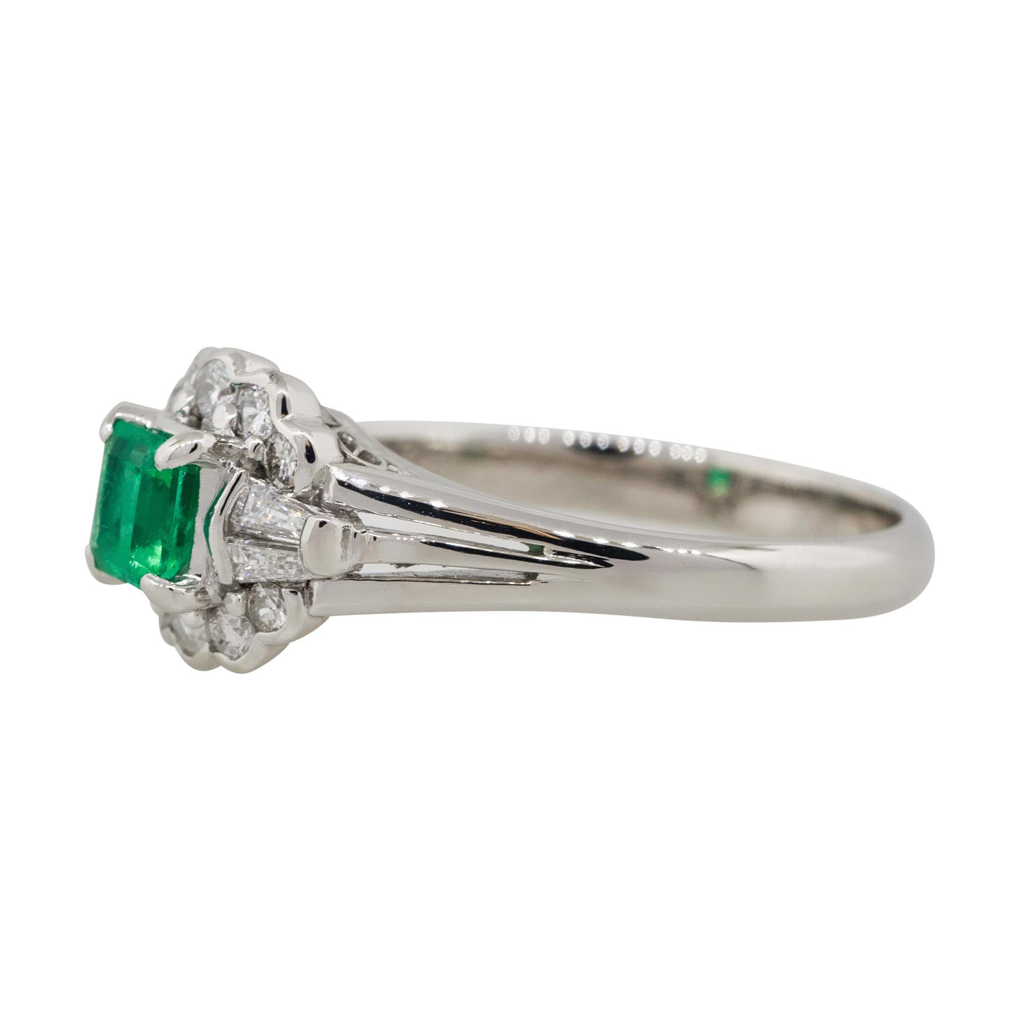 Material: Platinum
Center Gemstone Details: Approx. 0.37ctw Emerald center gemstone
Diamond Details: Approx. 0.30ctw of round cut and baguette shaped Diamonds. Diamonds are G/H in color and VS in clarity
Size: 6.25
Total weight: 4.9g