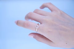 0.37 Carat Morganite Oval Cut and Diamond 10K Rose Gold Engagement Ring