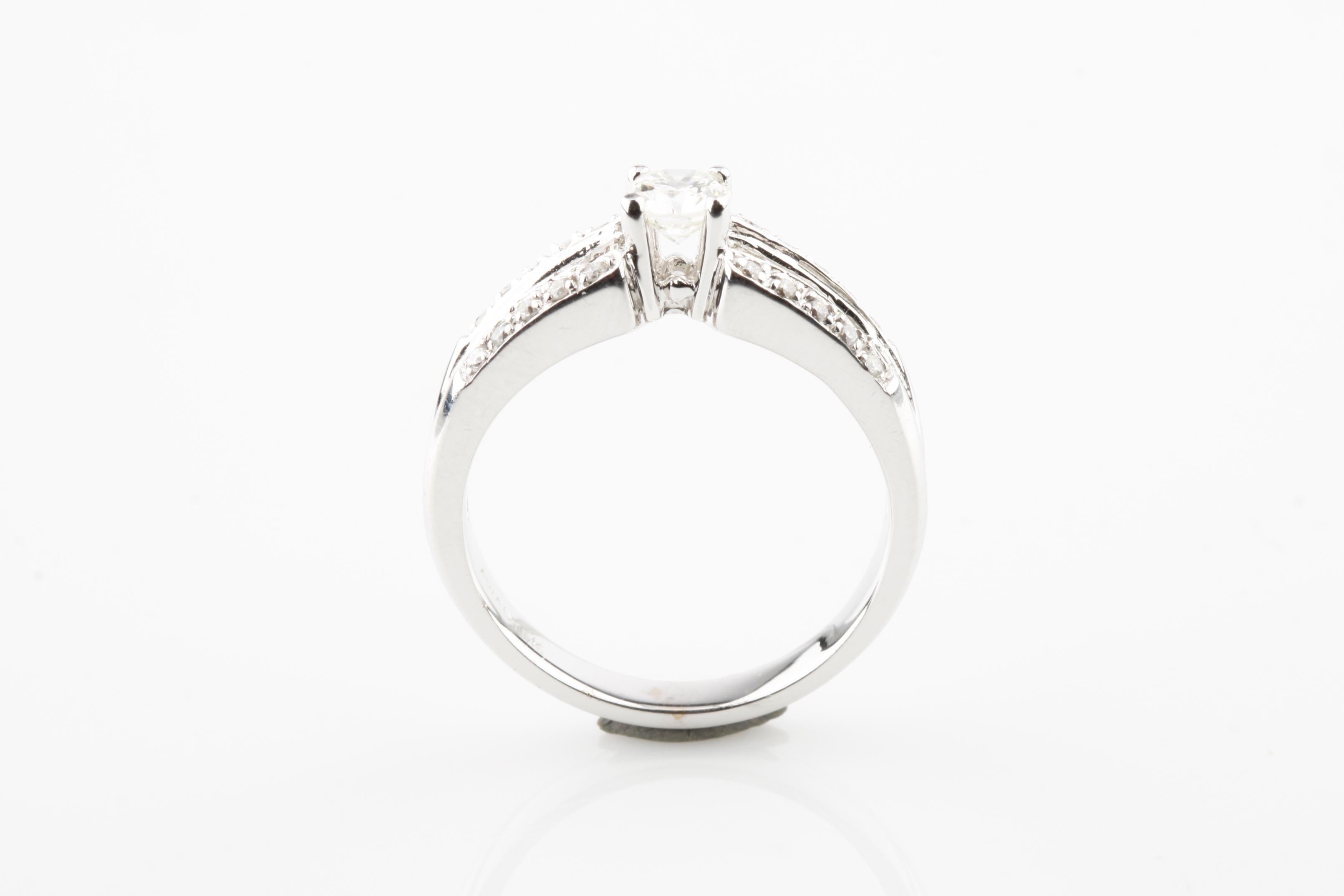 Modern 0.37 Carat Round Diamond Solitaire Ring in White Gold with Accents For Sale