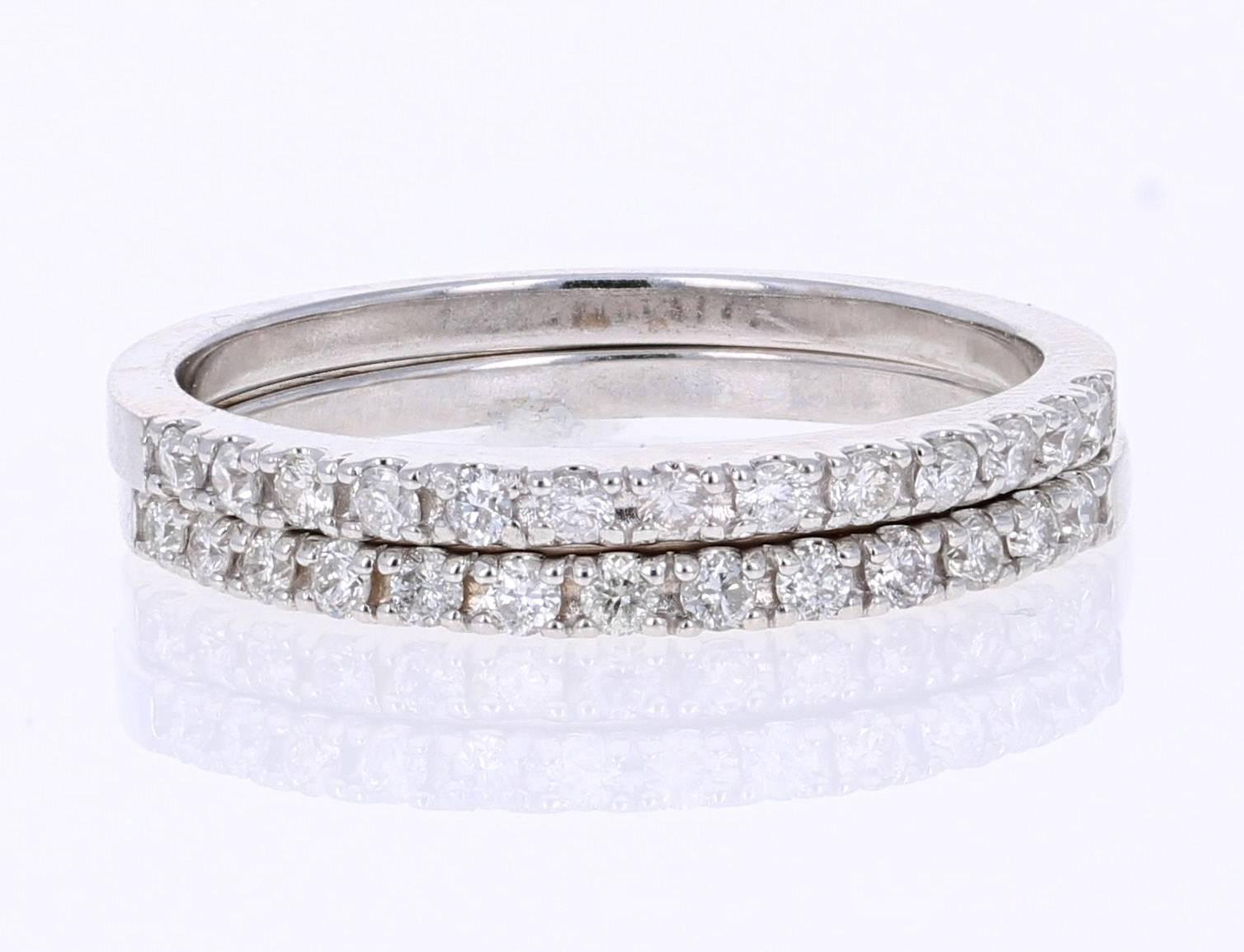 0.38 Carat Round Cut Diamond White Gold Stackable Bands!

Set of 2 elegant and classy 0.38 Carat Diamond bands that are sure to be a great addition to your accessory collection!   There are 13 Round Cut Diamonds that weigh 0.19 carats in each band. 