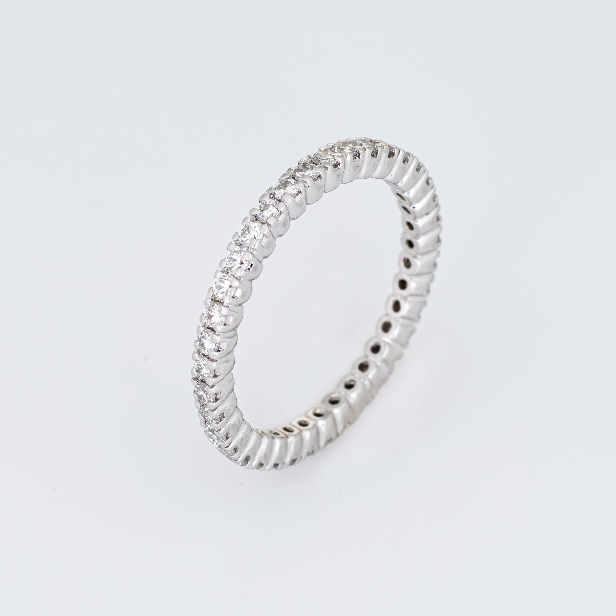 Stylish diamond eternity ring crafted in 900 platinum. 

A total of 38 round brilliant cut diamonds total an estimated 0.38 carats (estimated at H-I color and VS2-SI2 clarity). 

The simple and elegant band is set with full cut diamonds. It would