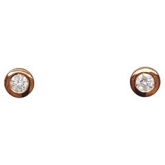Clous d'oreilles en or rose 18 carats sertis de diamants 0,38 carat
