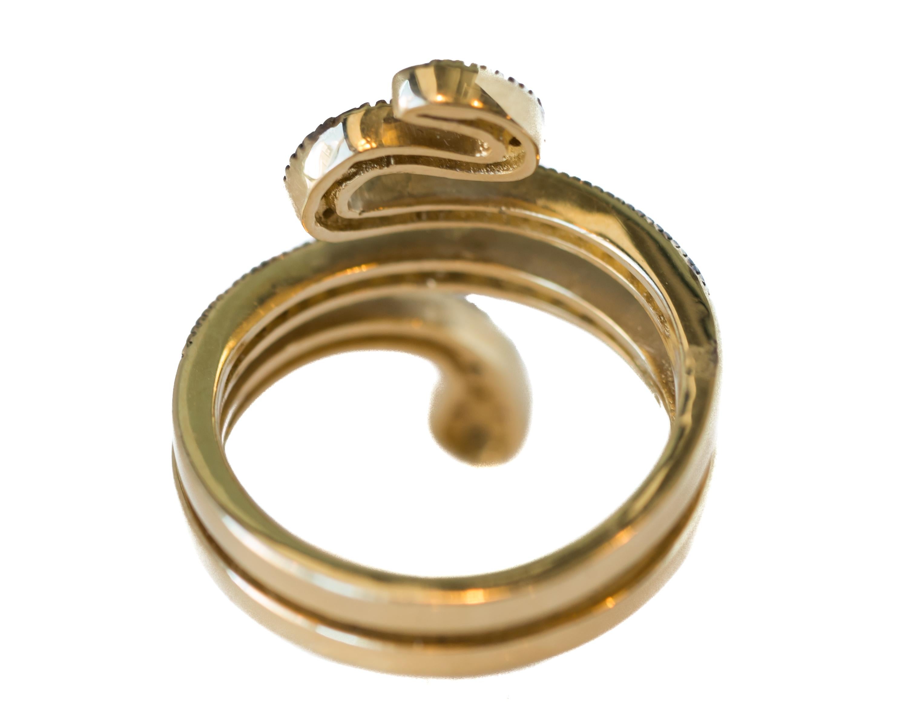 Contemporary 0.39 Carat Diamond and Ruby 14 Karat Gold Serpent Ring