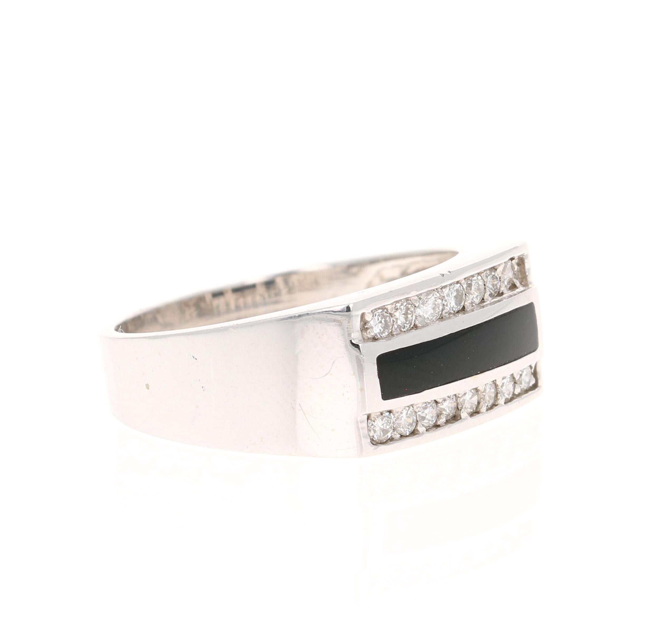 This ring is set with 15 Round Cut White Diamonds that weight 0. 39 carats and also has Black Onyx imbedded in the middle of the ring. 

It is beautifully curated in 14 Karat White Gold and weighs approximately  6.4 grams. 

The ring is a size 10