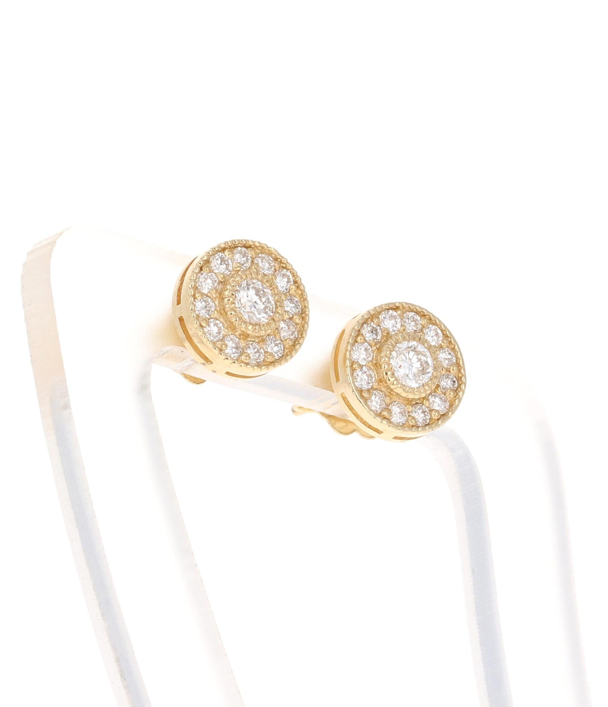 Ce modèle unique de boucles d'oreilles en diamant est composé de 26 diamants ronds de 0,39 carats, d'une clarté et d'une couleur de SI1-H. 
Elles sont serties en or jaune 14 carats et pèsent 1,5 gramme.

La largeur des boucles d'oreilles est de 8,5