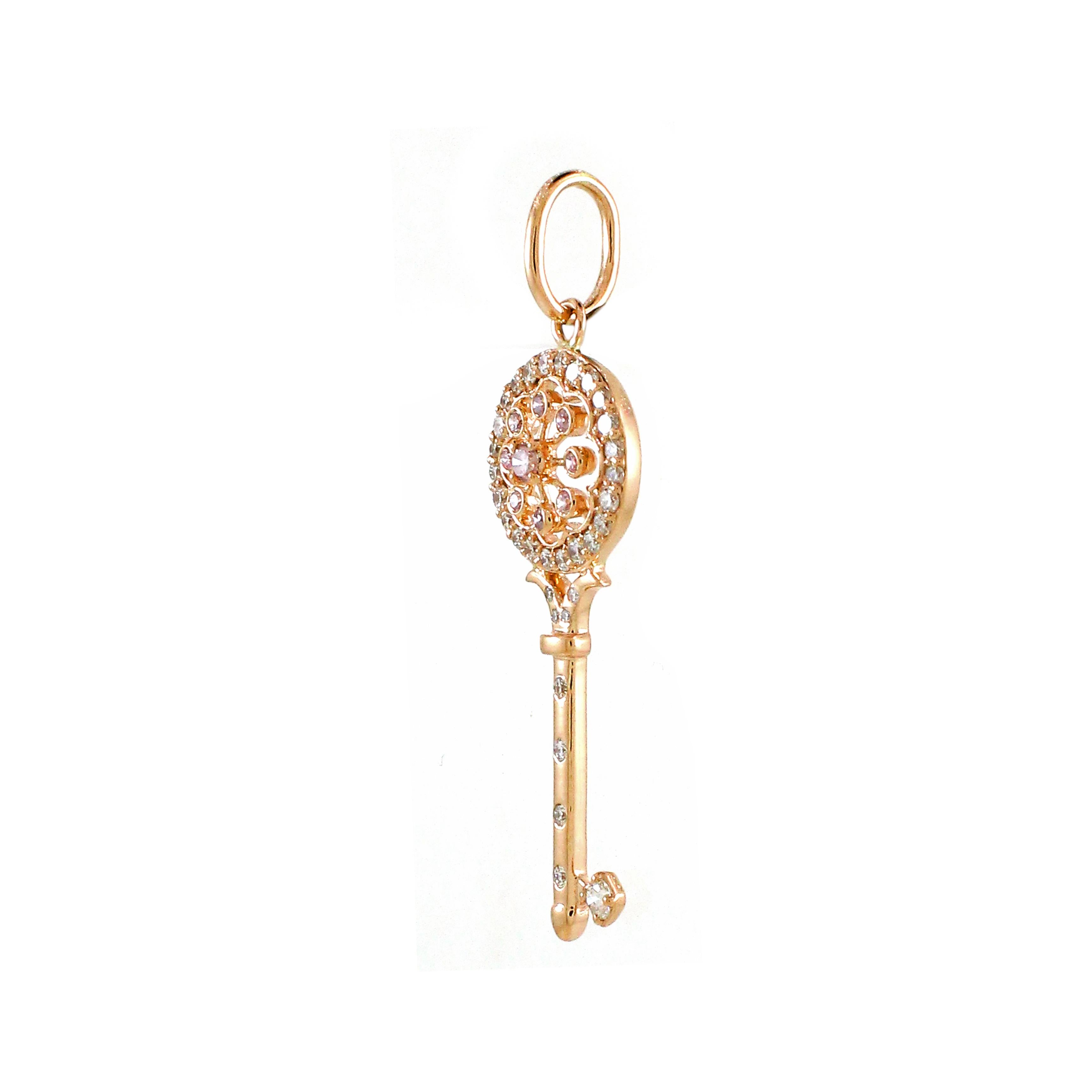 Experience the epitome of modern elegance with our exquisite key-inspired pendant, expertly crafted from 18k rose gold, weighing 1.97 grams in total. This chic and versatile piece exudes sophistication with its sleek design, making it suitable for