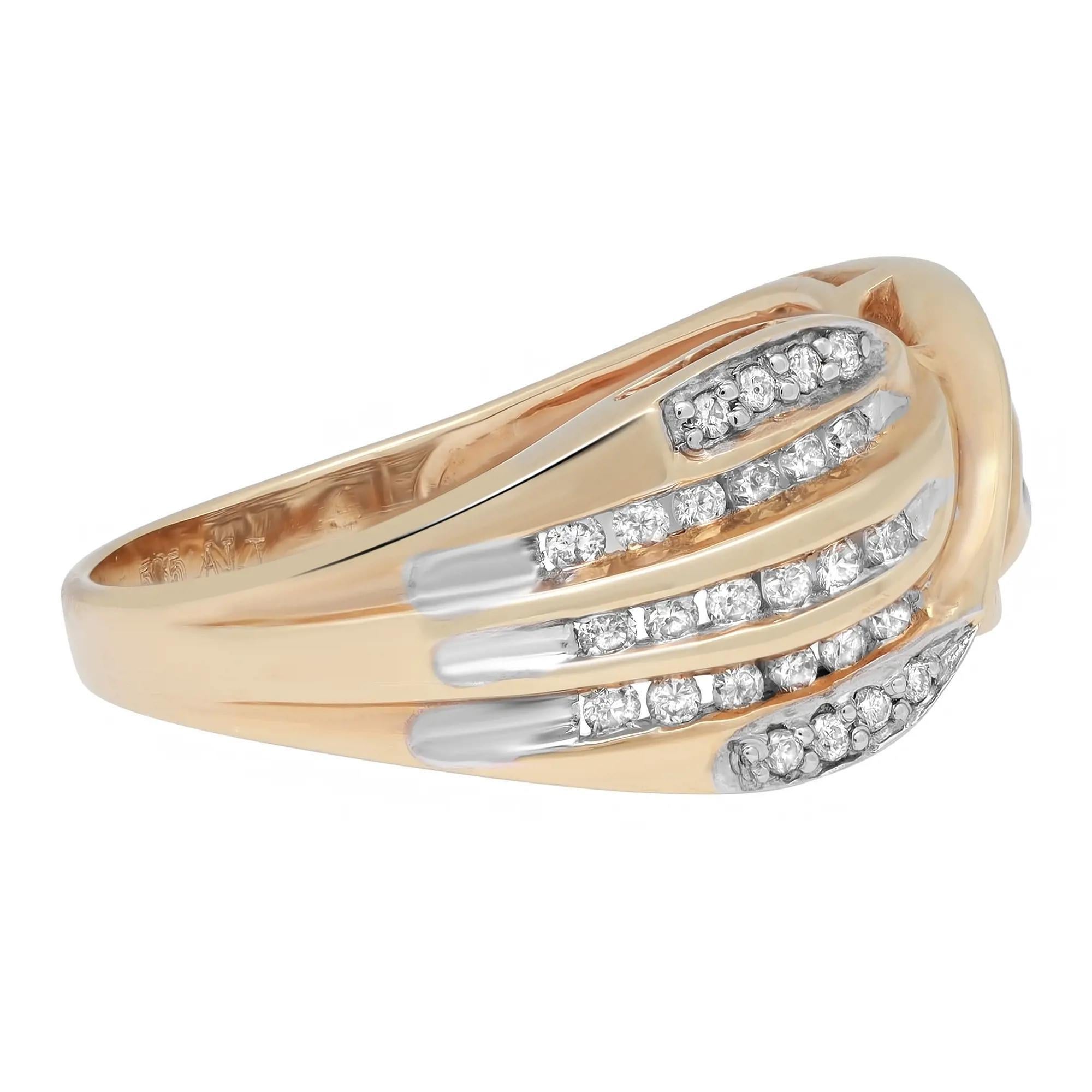 Classic and elegant diamond band ring rendered in highly polished 14K yellow gold. This ring features sparkling round brilliant cut diamonds in channel and prong settings totaling 0.39 carat. Diamond quality: I color and SI1 clarity. Ring size: