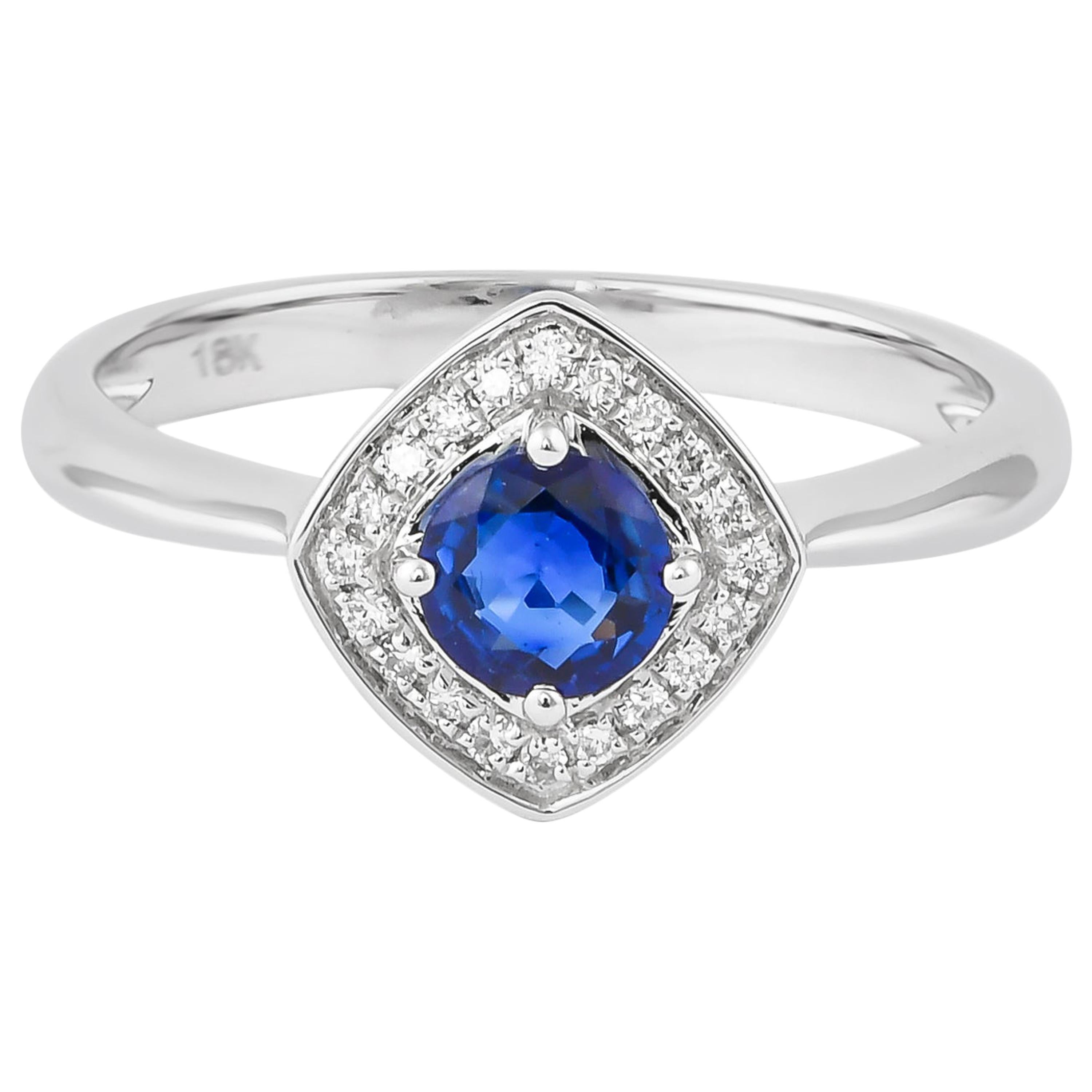 Bague en or blanc 18 carats avec saphir bleu de 0,4 carat et diamants