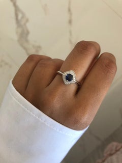 Sunita Nahata Blue Sapphire 0.40ct. Fancy Ring in 18KWG with Diamond.
