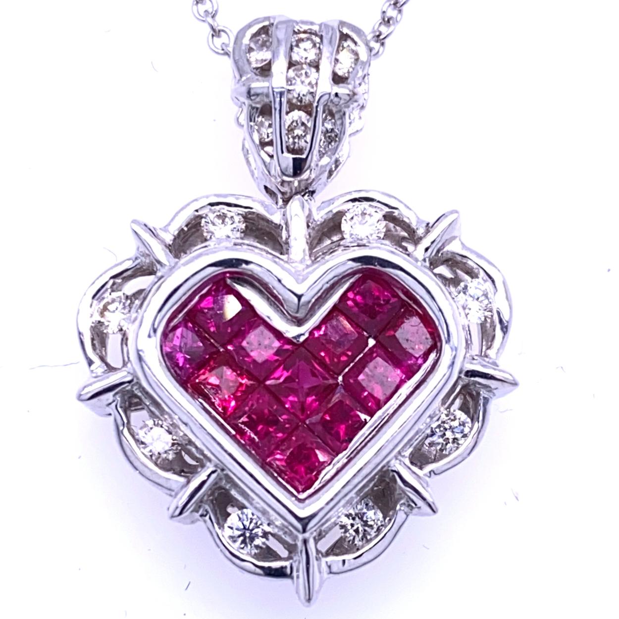 18K Gold Heart shaped Pendant with 12 Invisible Set Princess Cut Rubies (Total Gem Weight 1.30 Ct) surrounded by a Channel set Halo of diamonds and diamond set Bale with total weight of 0.40 Ct. 
Total Diamond Weight: 0.40 Ct
Total Gem Weight: 1.30