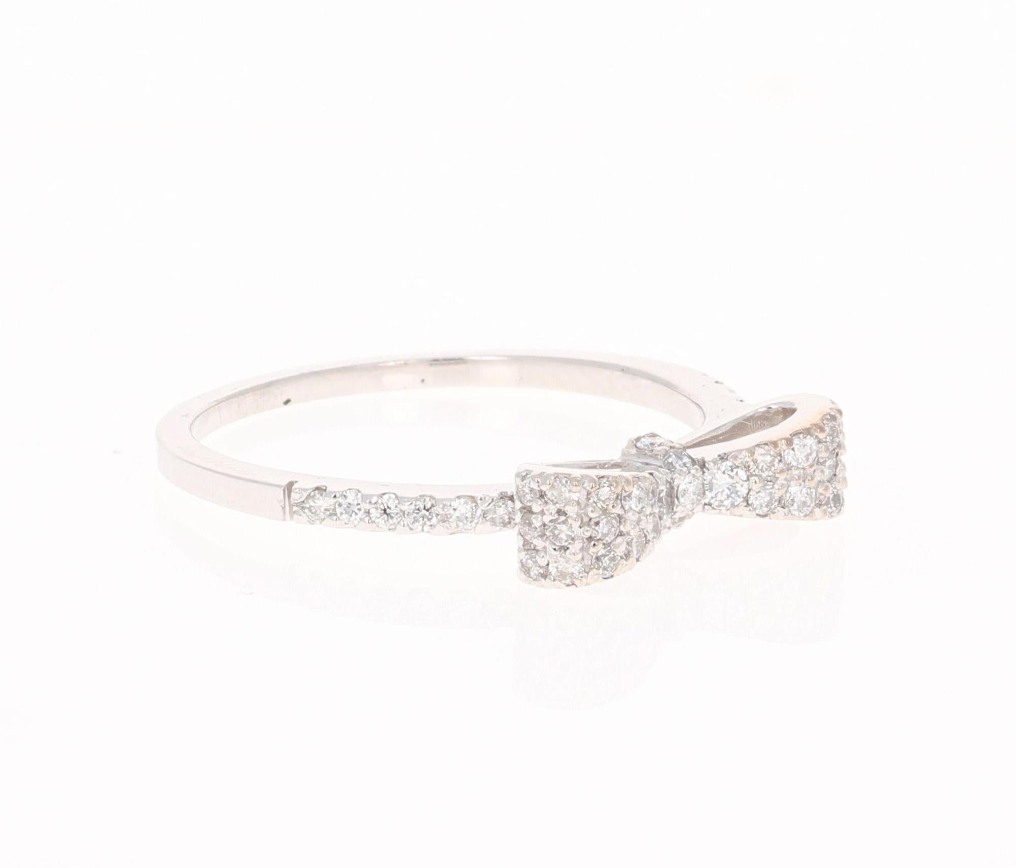 This cute and dainty band has 45 Round Cut Diamonds that weigh 0.40 Carats. The clarity and color of the diamonds are VS-H.

Crafted in 14 Karat White Gold and is approximately 2.4 grams 

The ring is a size 6 1/2 and can be re-sized at no