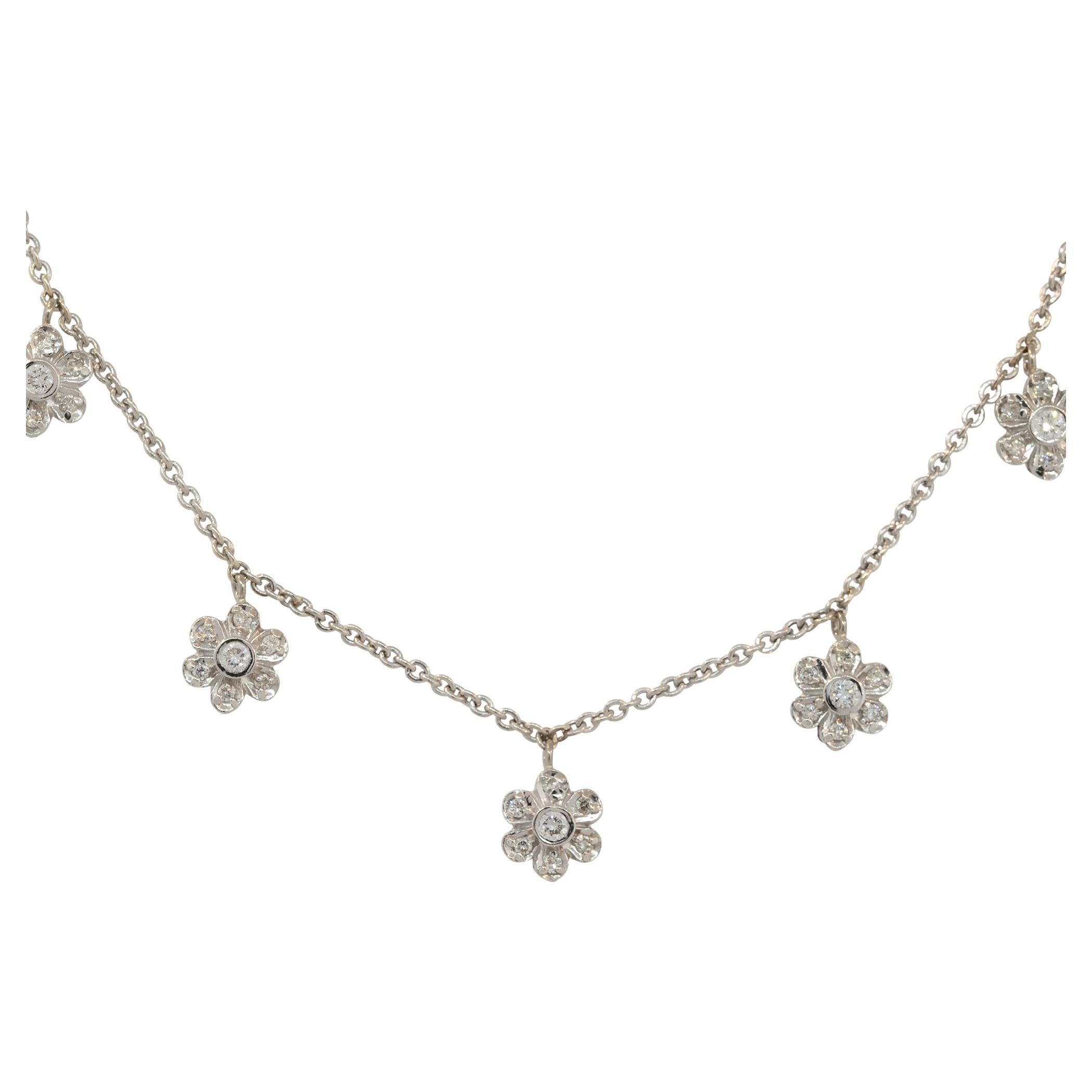 14k White Gold 0.40ctw Diamond Five Flower Necklace
Material: 14k White Gold
Diamond Details: Approximately 0.40ctw of Round Diamonds. Diamonds are G/H in color and VS in clarity
Total Weight: 6.4g (4.1dwt) 
Length: 15
