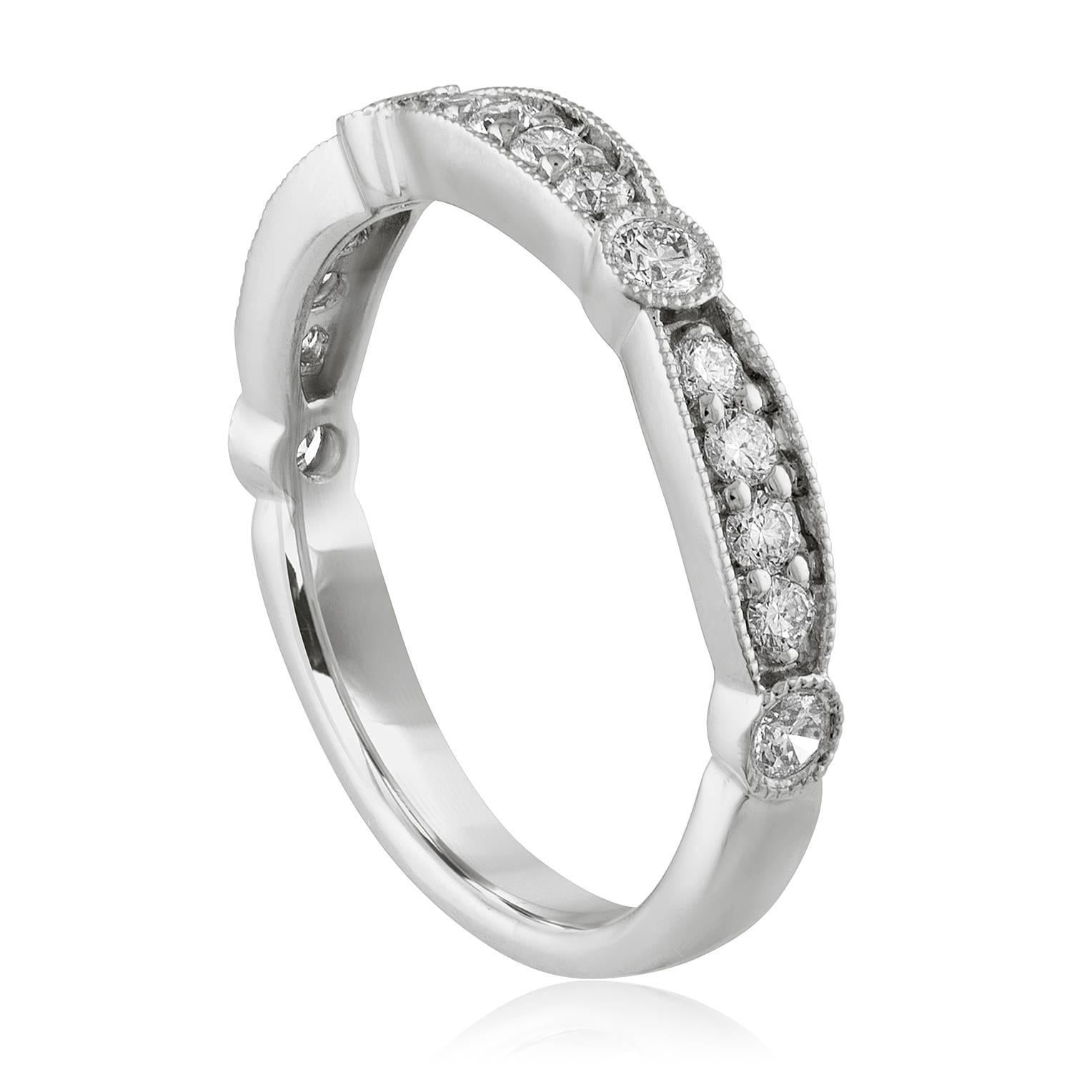 Beautiful Milgrain Diamond Wedding Band
The band is 14K White Gold
There are 0.40 Carats in Diamonds F VS/SI
The ring is a size 5.5, sizable
The ring weighs 2.4 grams
