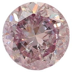 Diamant rond de 0,40 carat brun clair et rose violacé I1 pureté CGL Cert
