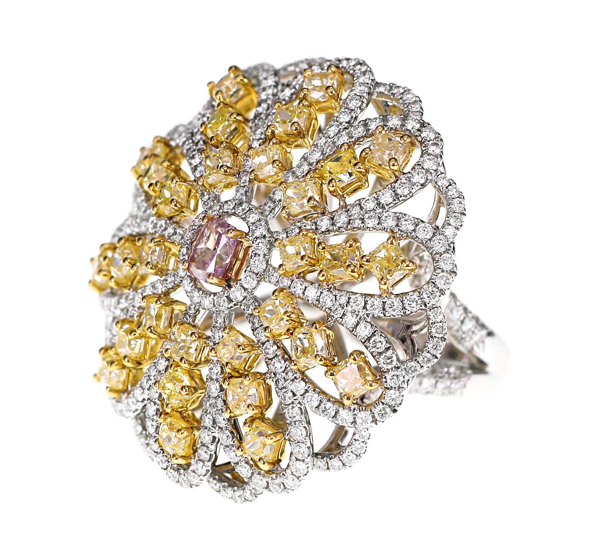 A Non certified Intense Pink Diamond is set in the center.
4.06 carats of Fancy Intense Yellow shapes are also set together.
2.26 carats of FG color VS quality white diamond are also set
Ring Size : US 6.25