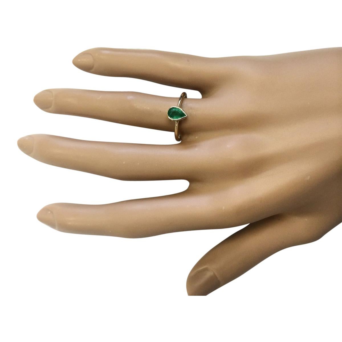 Pear Cut Emerald Ring In 14 Karat Yellow Gold  For Sale