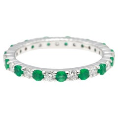 Anello con diamante rotondo da 0,40 carati con zaffiro verde naturale Greene
Greene