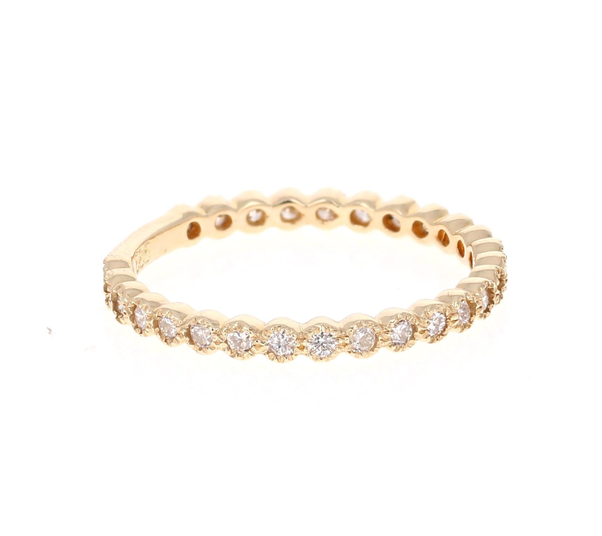 
This ring has 27 Round Cut Diamonds that weigh 0.40 Carats. The clarity and color of the diamonds are VS-H.

Crafted in 14 Karat Yellow Gold and is approximately 1.5 grams 

The ring is a size 6.5 and can be re-sized at no additional charge!