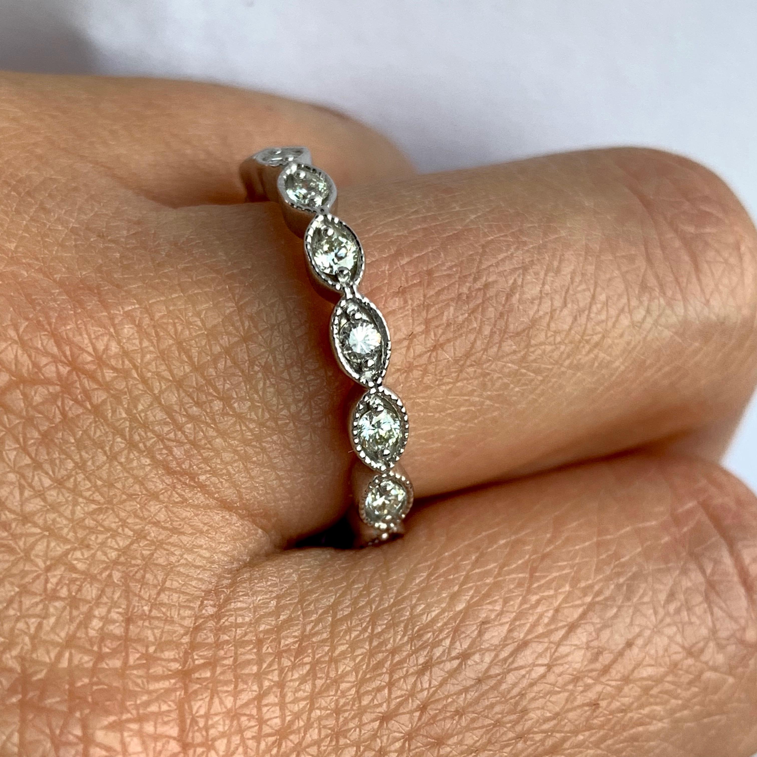 Material: 14k White Gold
Center Stone Details: 10 Brilliant Round White Diamonds at 0.40 Carats - Clarity: SI / Color: H-I
Ring Size: Size 6.75. Alberto offers complimentary sizing on all rings.

Fine one-of-a-kind craftsmanship meets incredible