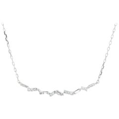 Splendide chaîne collier en or blanc massif 14 carats de 0,40 carat