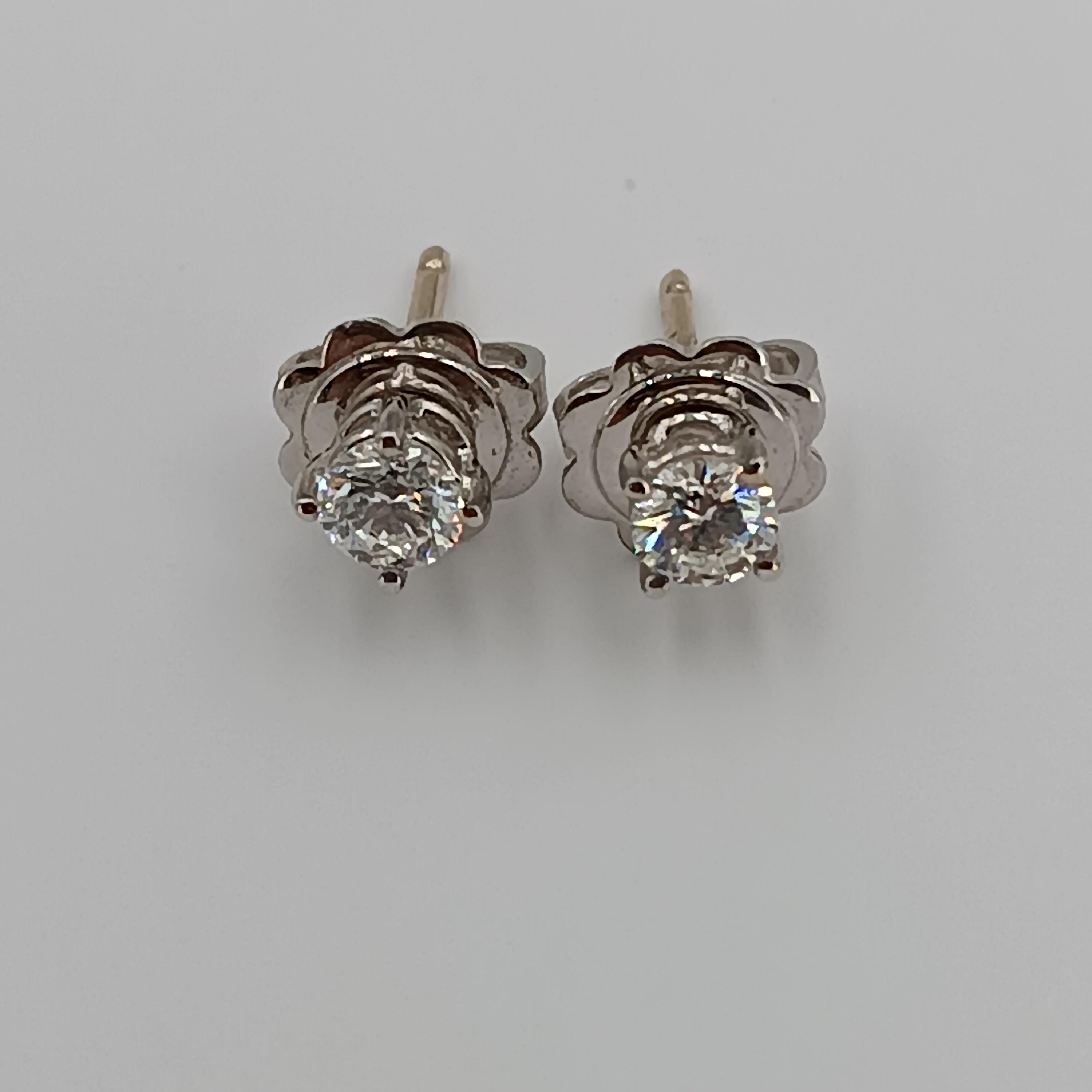 This timeless classic  is all about the round brilliant cut stone, a magnificent 0.40 carat VS G color stone, mounted on a refined 18 carat white gold earring.s grams 1.83
any item of our jewelry collection has a dedicated identification number