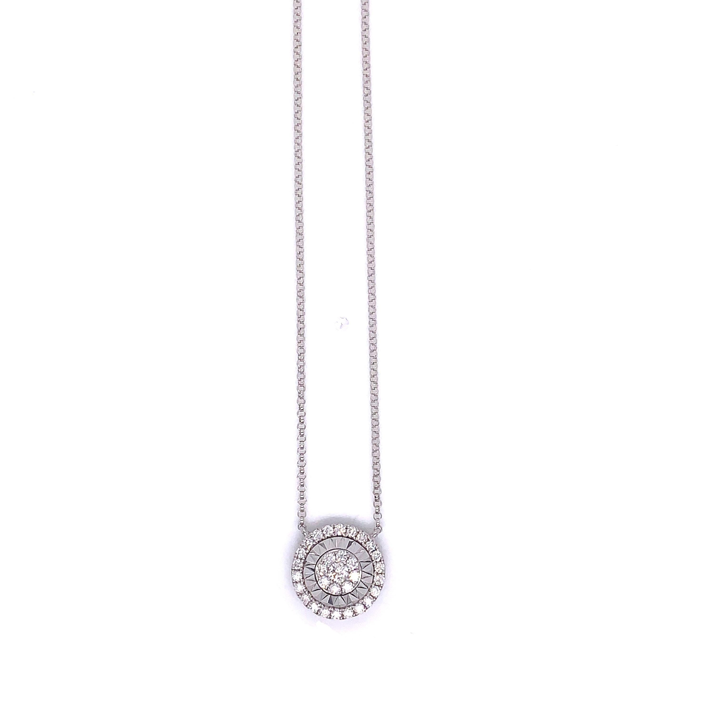 Give her a special gift she'll always treasure with this dazzling 0.40 carat diamond cluster pendant necklace. The gorgeous design features sparkling round cut white diamonds and 18k white gold. In the back there is a movable clasp that glides down