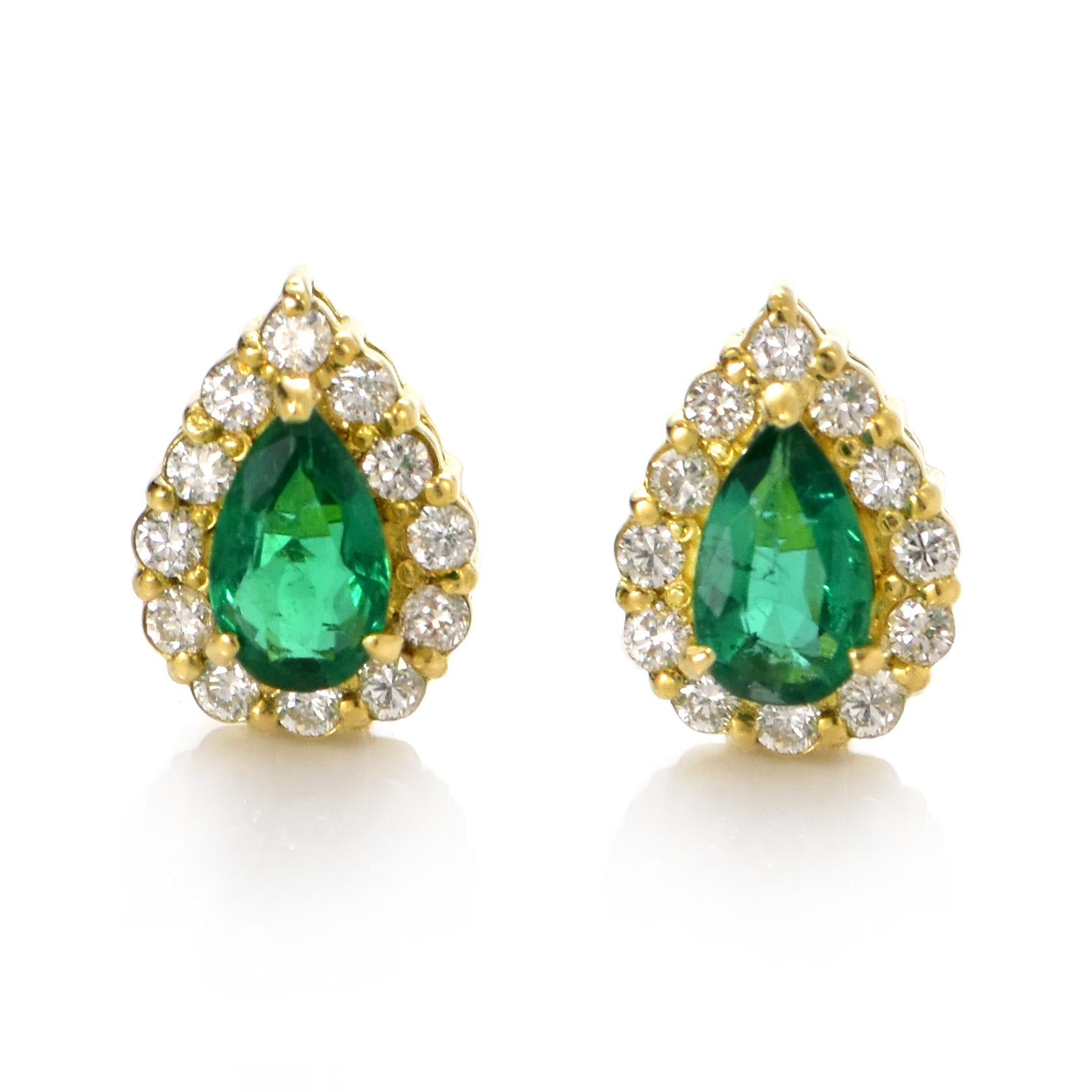 A stunning pierce featuring a total of 0.40 Carats Natural Zambian Emeralds and 0.20 Carats of Diamond Accents set in 18 Karat Yellow Gold. People have admired emerald’s green for thousands of years. Emeralds have always been associated with the