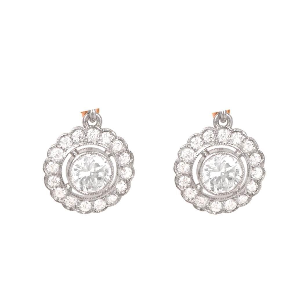 Elevate your style with the timeless elegance of these Art Deco-inspired floral diamond earrings. Meticulously handcrafted in platinum with 18k yellow gold backs, these earrings exude a luxurious and sophisticated aura.

Each of the earring