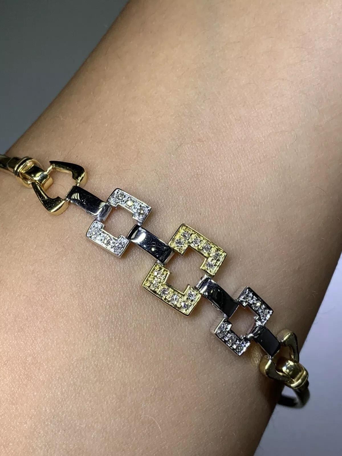 0.40ct Diamond bangle bracelet in 18k yellow and white gold.

Diamonds total weight 0.40ct G colour VS2 clarity.

Hallmarked.

Length 7 inches.

Weight 14.1g

The box and valuation included.

This stunning bracelet is a must-have for any jewellery