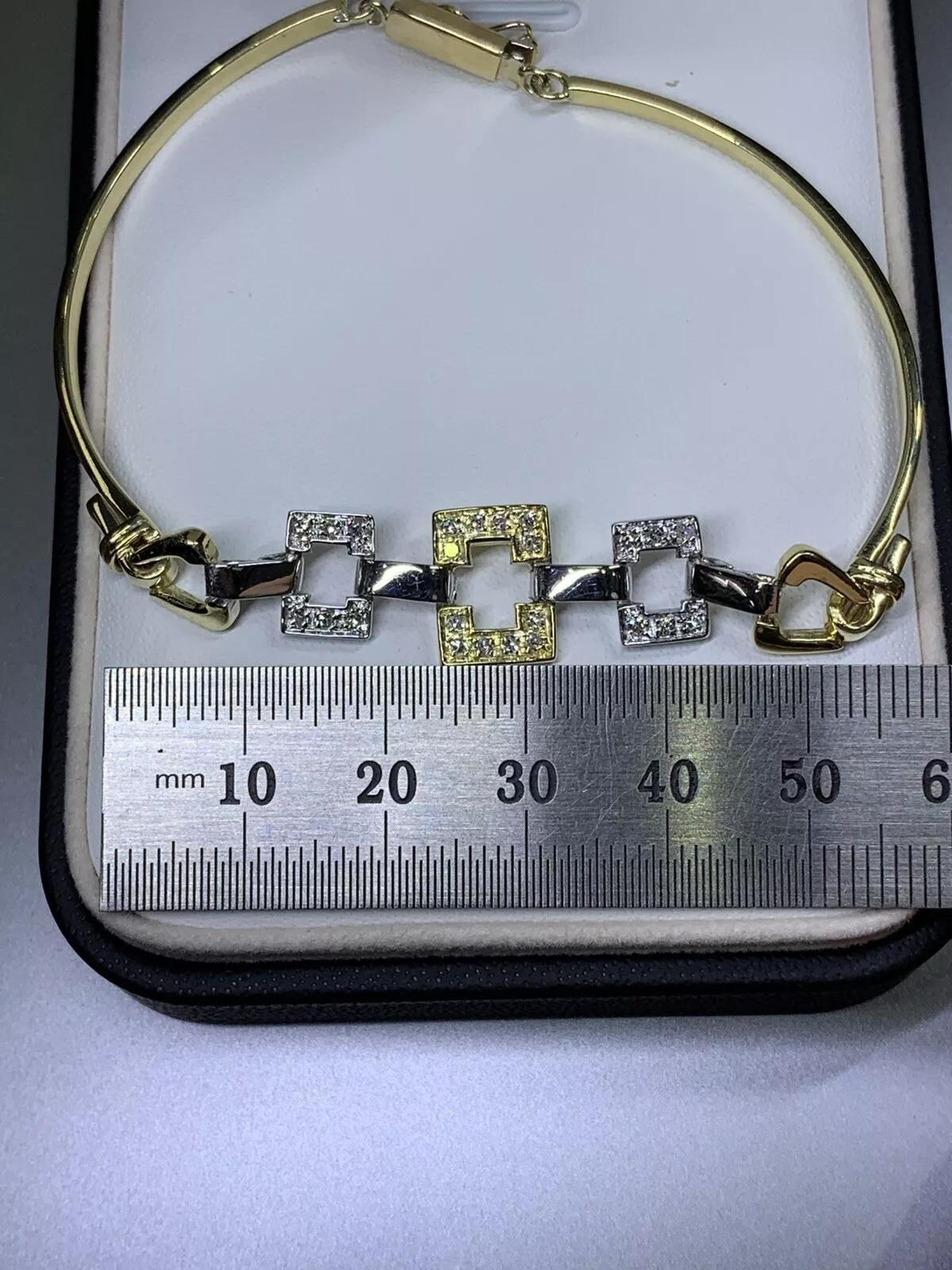 0.40ct Diamond bangle bracelet in 18ct yellow and white gold 7 inches 14.1g In New Condition For Sale In London, GB
