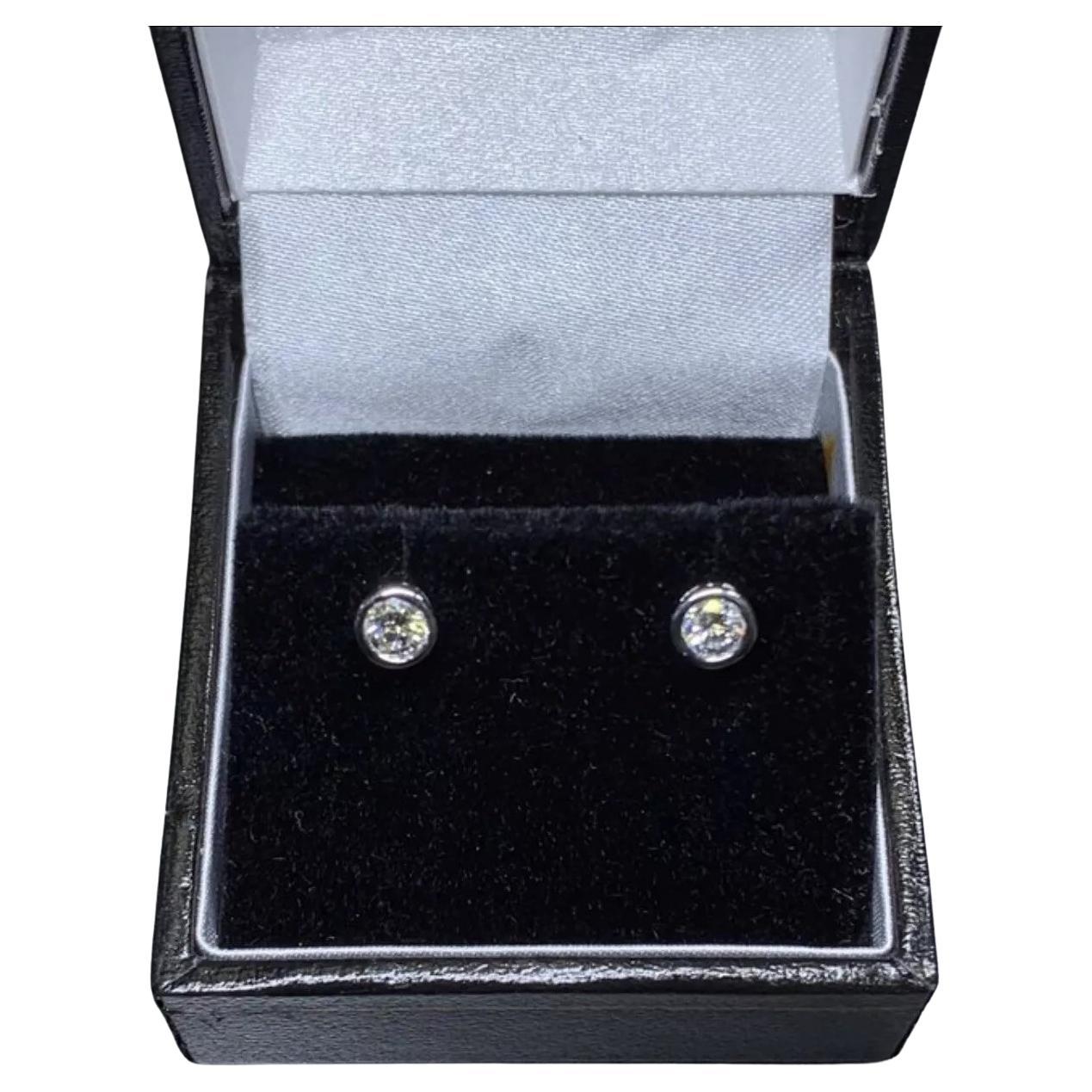 0.40ct Diamond studs earrings bezel rub over 18ct white gold For Sale