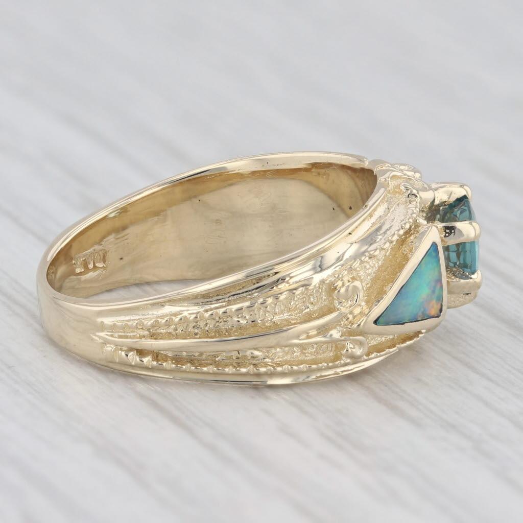 Gemstone Information:
- Natural Alexandrite -
Carats - 0.40ct 
Cut - Oval Brilliant
Color - Green

- Natural Opals -
Size - 4 x 6.25 mm
Cut - Triangle
Color - Blue Green Multicolor

Metal: 14k Yellow Gold
Weight: 6.4 Grams 
Stamps: 14k
Face Height:
